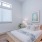 bedroom with bed and large window
